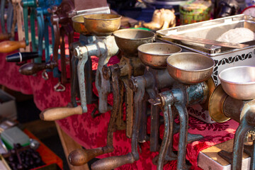An assortment of vintage old meat grinders at a flea market. Vienna At Naschmarkt