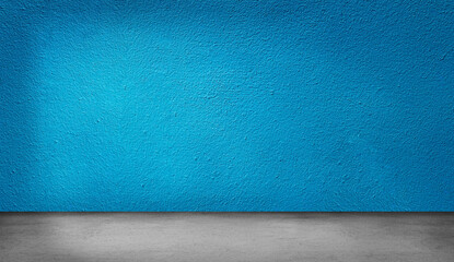 Empty space studio room of Blue concrete wall texture background with light shading for interior design and product showing.