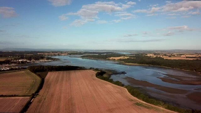Drone Flight over field looking South down Chichester Channel - Chichester Harbour