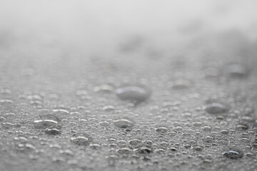 Photo of water with soapy bubbles with narrow depth of field