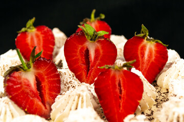 Tiramisu cake decorated with a slice of strawberries
