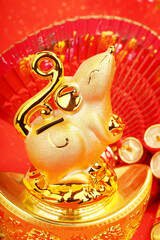 Fototapeta premium Tradition Chinese golden rat statue rat,2020 is year of the rat,Chinese characters on decoration translation: good bless for new year.