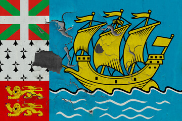 Naklejka premium Saint Pierre And Miquelon flag close up old, damaged and dirty on wall peeling off paint to see inside surface. Vintage National Concept.