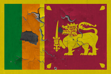 Sri Lanka flag close up old, damaged and dirty on wall peeling off paint to see inside surface. Vintage National Concept.