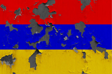 Armenia flag close up painted, damaged and dirty on wall peeling off paint to see concrete surface. Vintage National Concept.