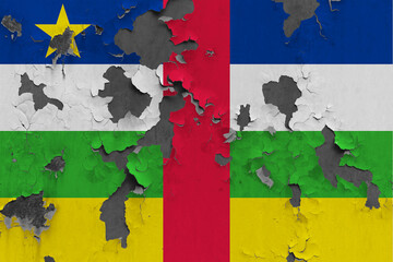 Central African Republic flag close up painted, damaged and dirty on wall peeling off paint to see concrete surface. Vintage National Concept.