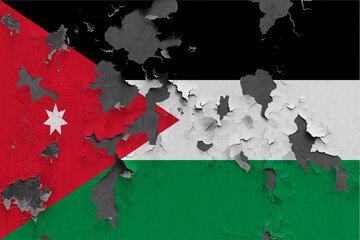 Jordan flag close up painted, damaged and dirty on wall peeling off paint to see concrete surface. Vintage National Concept.