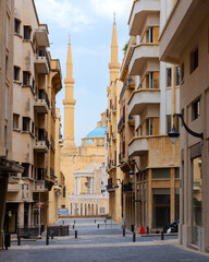 Fototapeta premium Perspective of newly rebuilt Nejmeh square area in Beirut Downtown city center and Al Amine blue mosque, Lebanon