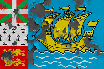 Fototapeta na wymiar Saint Pierre And Miquelon flag close up painted, damaged and dirty on wall peeling off paint to see concrete surface. Vintage National Concept.
