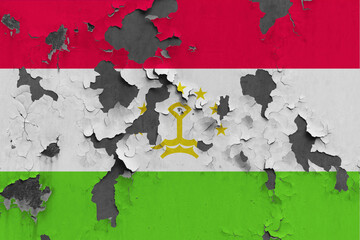 Tajikistan flag close up painted, damaged and dirty on wall peeling off paint to see concrete surface. Vintage National Concept.