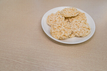 Rice pop cakes on a white plate