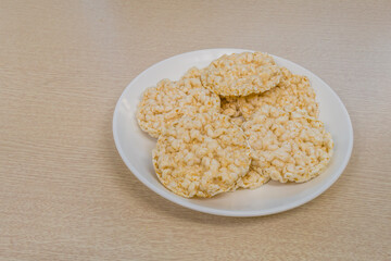 Rice pop cakes on a white plate