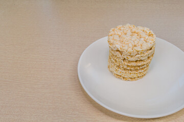 Rice pop cakes on a white plate
