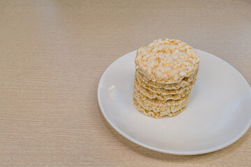 Rice pop cakes on a white plate
