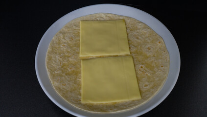 Mozzarella cheese on flour tortilla