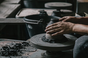 Artisan potter making art pot handicraft