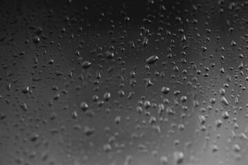 Raindrops on window glass,condensation on the window,natural background
