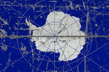 Antarctica flag painted on cracked dirty surface. National pattern on vintage style surface. Scratched and weathered concept.