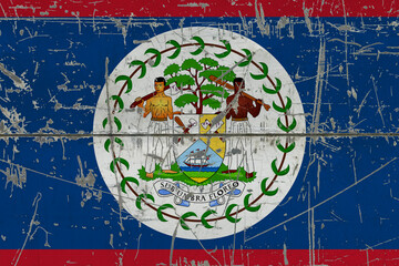 Belize flag painted on cracked dirty surface. National pattern on vintage style surface. Scratched and weathered concept.