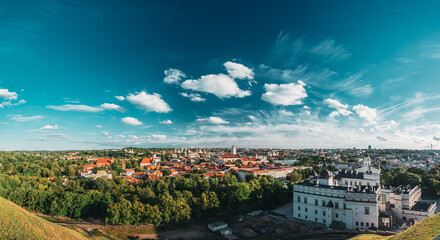 Vilnius, Lithuania. Old Town Historic Center Cityscape Under Dramatic Sky And Bright Sun In Sunny Summer Day. Travel Panorama. UNESCO. Famous And Popular Place