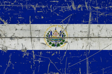 El Salvador flag painted on cracked dirty surface. National pattern on vintage style surface. Scratched and weathered concept.