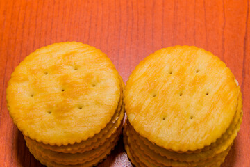 Two stacks of round butter crackers