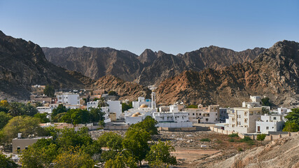 Fototapeta na wymiar A typical Omani village of white washed houses. 