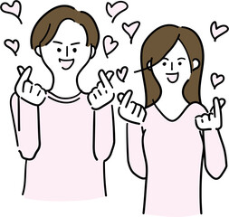 指ハートをする二人組。