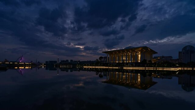 4K Dramatic sunrise timelapse during blue hour at the iron mosque or also known as Tuanku Mizan Zainal Abidin by the lake at Putrajaya, Malaysia.
H