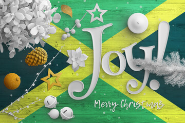 Jamaica flag on wooden table with joy text. Christmas and new year background, celebration national...