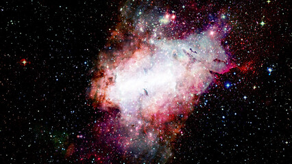 Hubble views galaxy and nebula. Elements of this image furnished by NASA