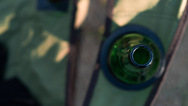 Green beer bottle. Outdoor recreation. Camp chair. High quality photo