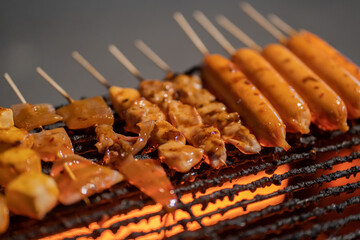 
Meatballs on skewers are granny on the stove.