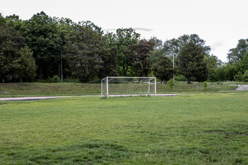 old white gate on the football field. Sports outdoors