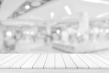 Empty white table top, counter over blur white bokeh light background. wooden shelf for product display, banner or mockup.