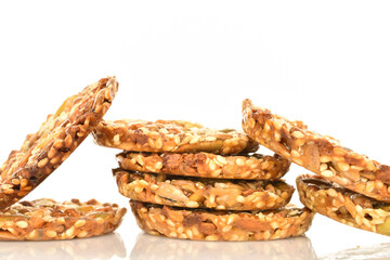 Several fresh fragrant tasty nutty cookies on a white background.