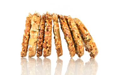 Several fresh fragrant tasty nutty cookies on a white background.