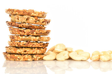 Several fresh fragrant tasty nutty cookies on a white background.