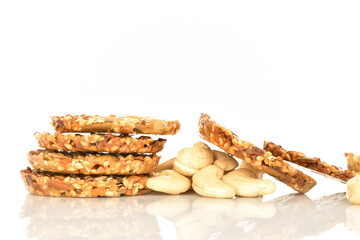 Several fresh fragrant tasty nutty cookies on a white background.