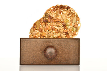 Several fresh fragrant tasty nutty cookies on a white background.