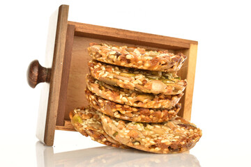 Several fresh fragrant tasty nutty cookies on a white background.