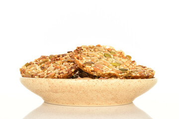 Several fresh fragrant tasty nutty cookies on a white background.