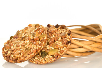 Several fresh fragrant tasty nutty cookies on a white background.