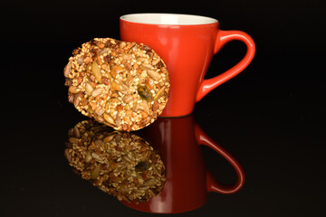 Several fresh fragrant tasty nutty cookies on a black background.