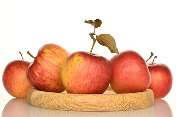 Ripe red apples, close-up, on a white background.