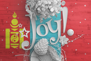 Mongolia flag on wooden table with Joy text. Christmas and new year background, celebration...