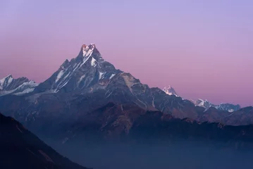 Papier Peint photo Dhaulagiri Fishtail peak or Machapuchare mountain  during sunset enviroment at Nepal.