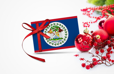 Belize flag on new year invitation card with red christmas ornaments concept. National happy new...