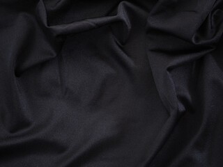 Smooth black silk or satin texture for wedding background.