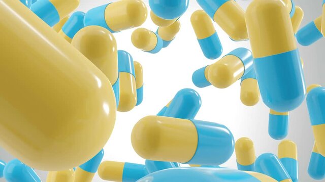 Bottom view of many capsule pills (Blue and yellow capsule) drop from the top in different position. Drugs for treatment medication. Anti covid. 3D rendering